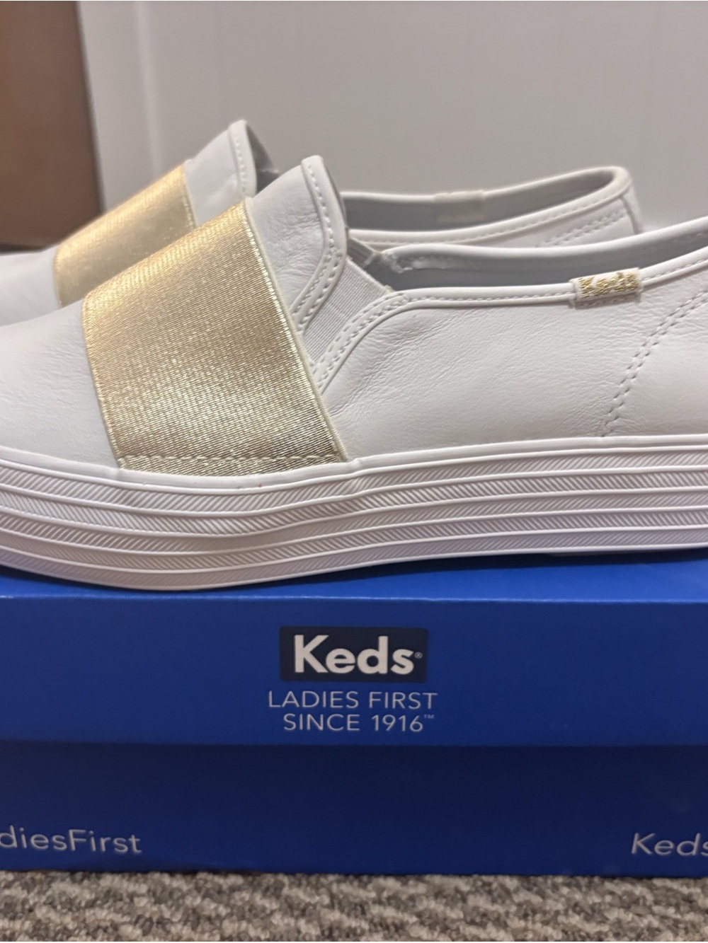 Keds White Slip-On Sneakers with Gold Elastic Band